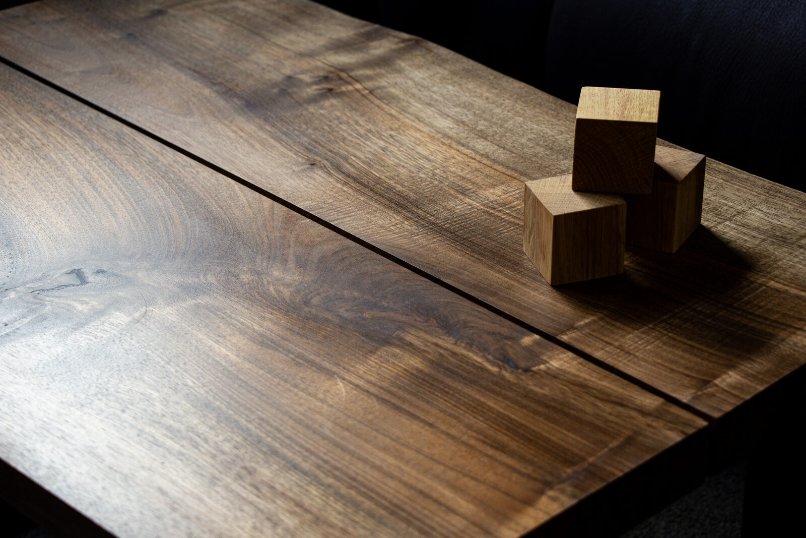 Stacked wooden blocks on a workbench