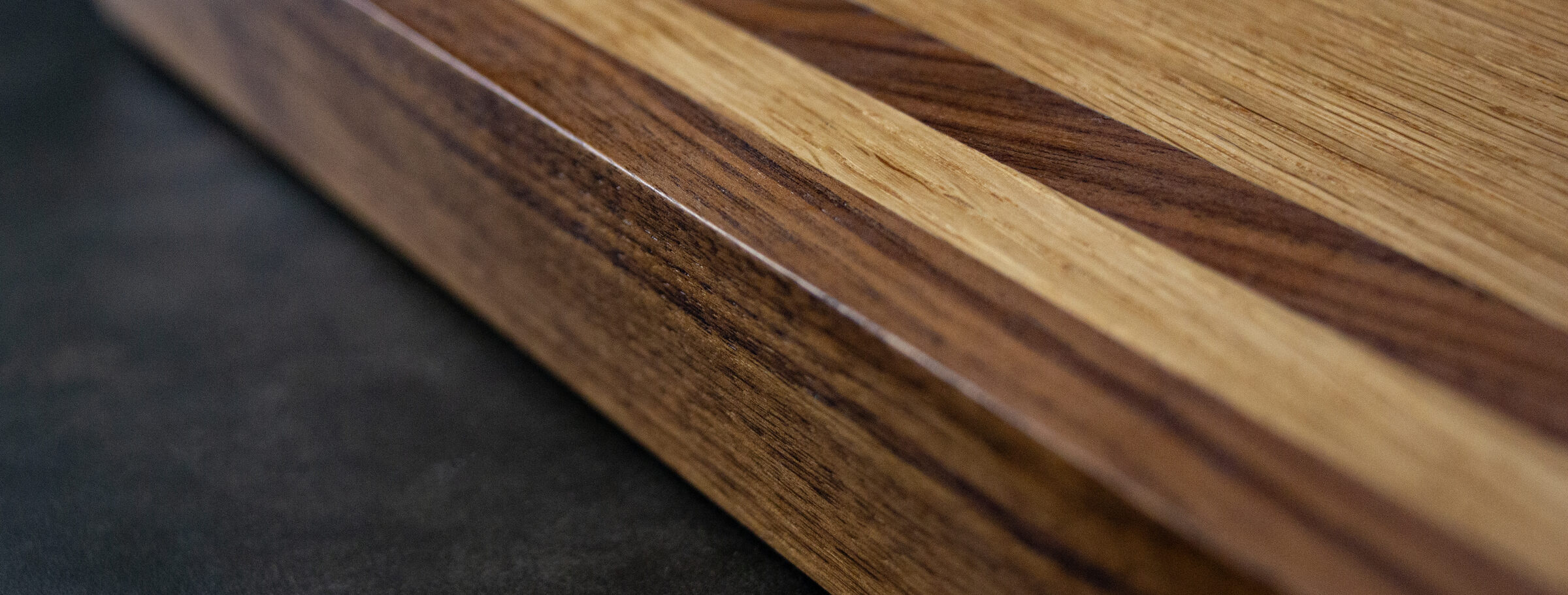 Close up of a hand-crafted wooden chopping board